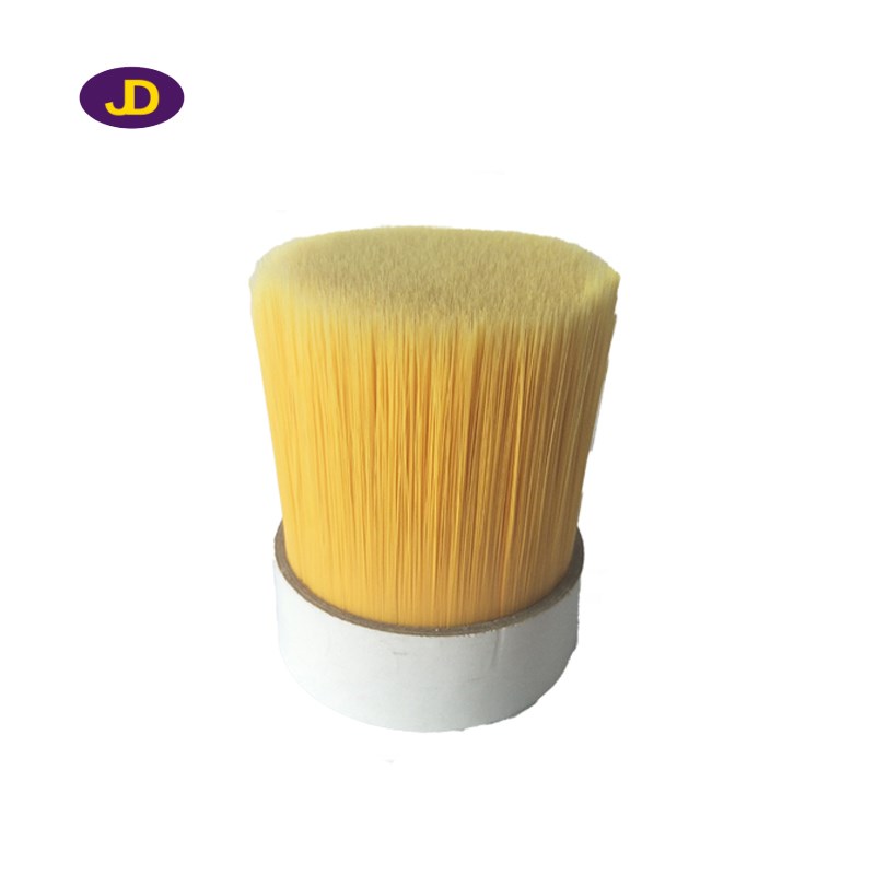 Yellow solid tapered brush filament